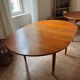 Scandinavian round teak table with butterfly extensions from the 60s