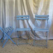6 blue folding garden chairs
