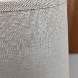 Oval table lamp in handcrafted ceramic with draped effect.