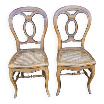 Pair of solid oak chairs with caned seats - 1930s