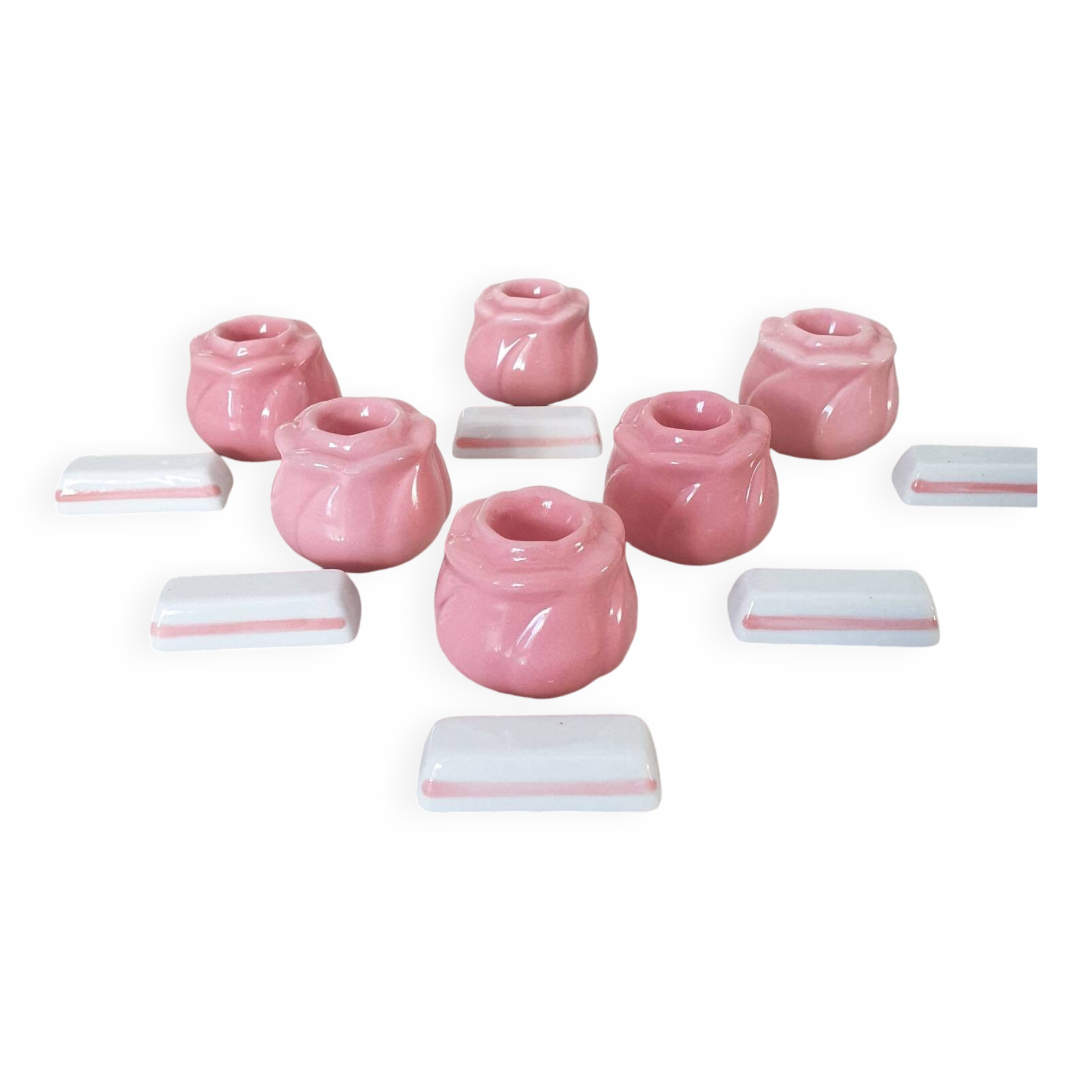 Pink candlesticks and porcelain knife holders