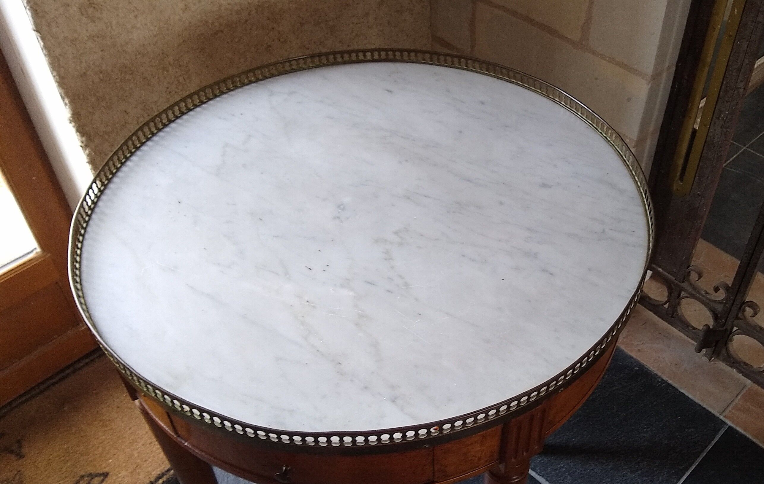 Mahogany hot water bottle table with marble top