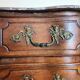 Louis XIV period Arbalette chest of drawers in solid walnut circa 1700