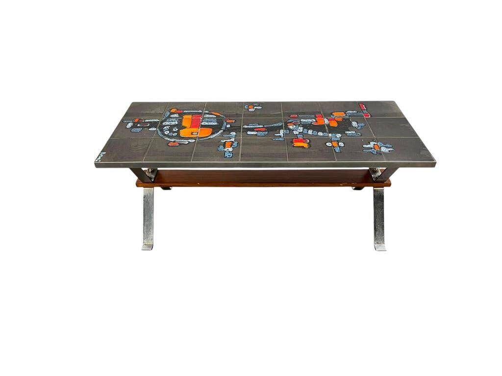 Vintage ceramic coffee table with chrome and wood accents.