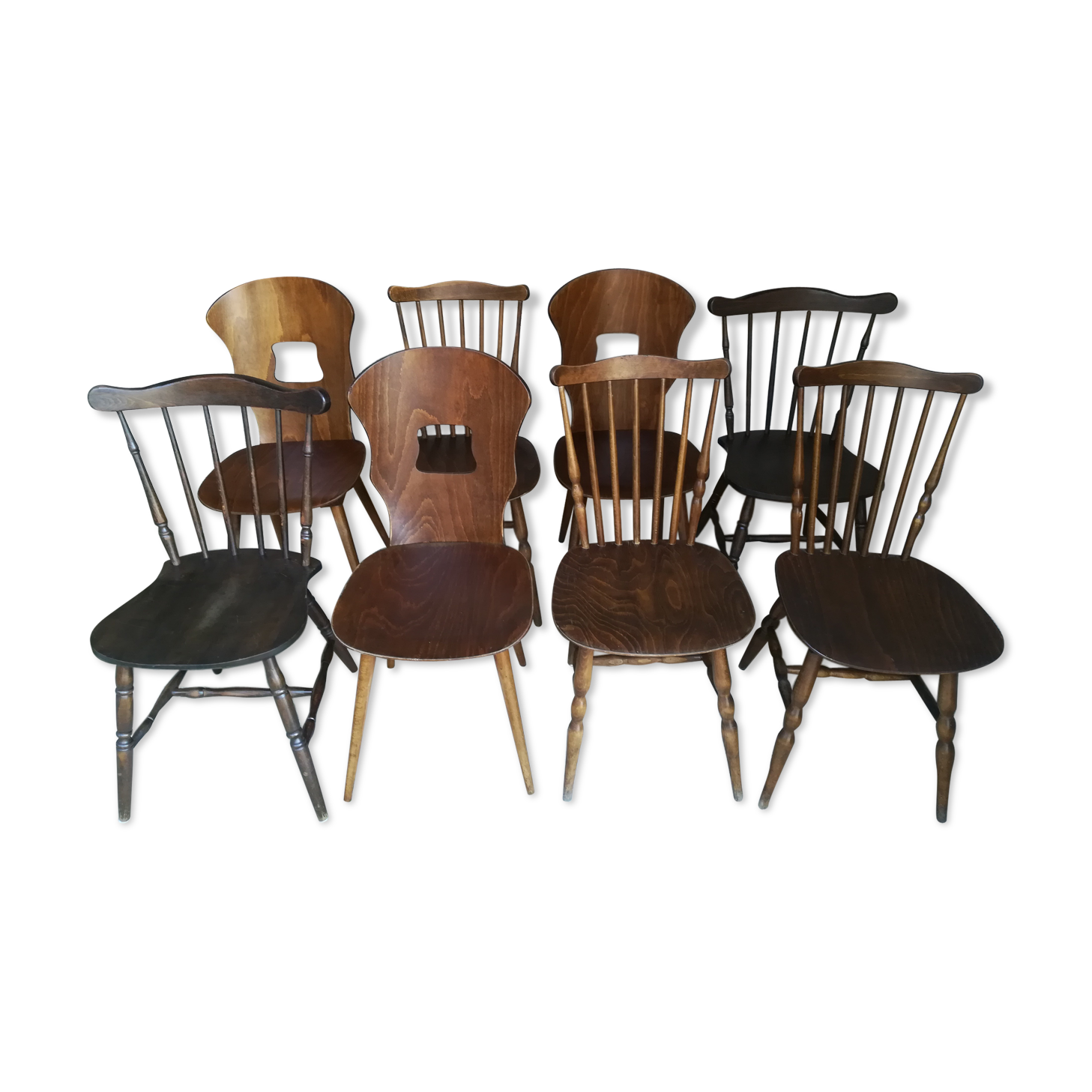 Eight mismatched bistro chairs