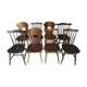 Eight mismatched bistro chairs