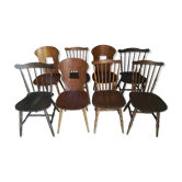 Eight mismatched bistro chairs