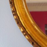 Round golden mirror