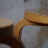 Alvar Aalto, a pair of vintage birch stools, model "60", made by Artek, 1970s.