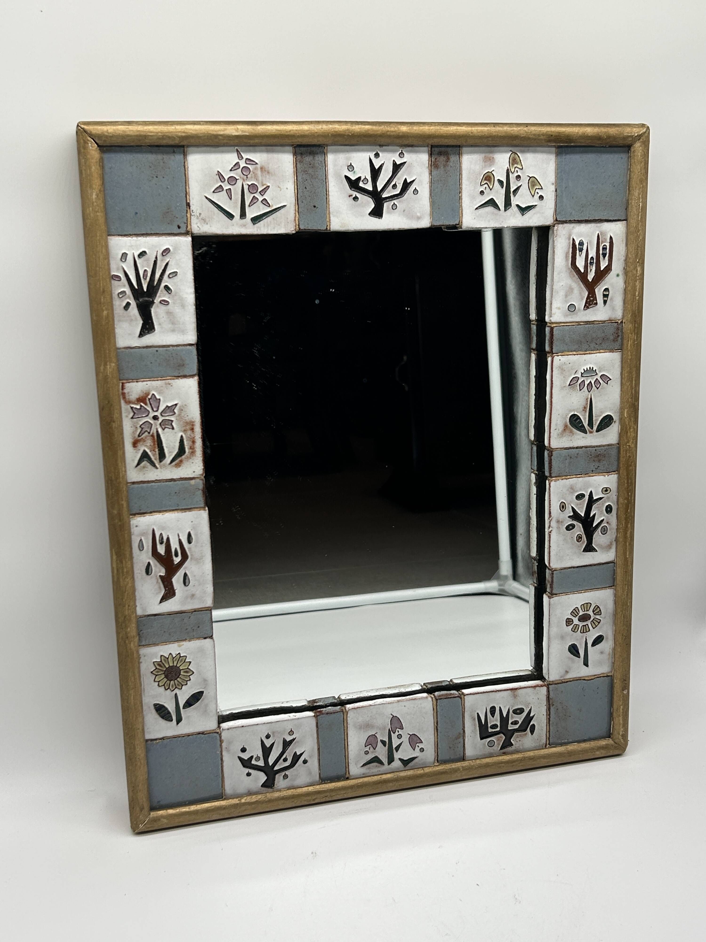 Ceramic enamelled mirror in the style of Odette Dijeux.