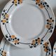 Service of 7 plates in earthenware