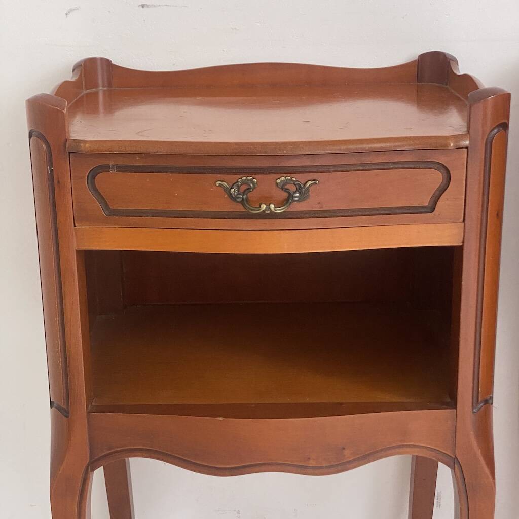 Pair of Louis XV style bedside tables in cherry wood.