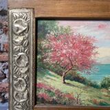 Pair of Art Deco wood and embossed metal landscape frames