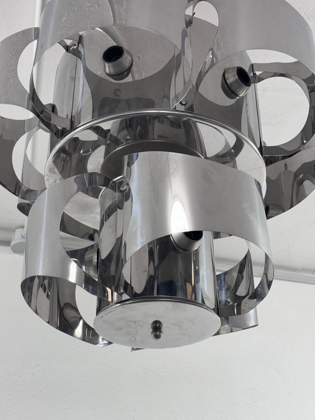 Curved steel chandelier attributed to Max Sauze, 9 lights