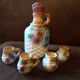 Bottle and its 4 slip cups