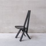Set of six black dining chairs