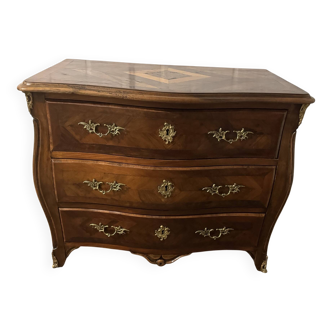 Old and small curved chest of drawers in the style of Hache, 19th century.