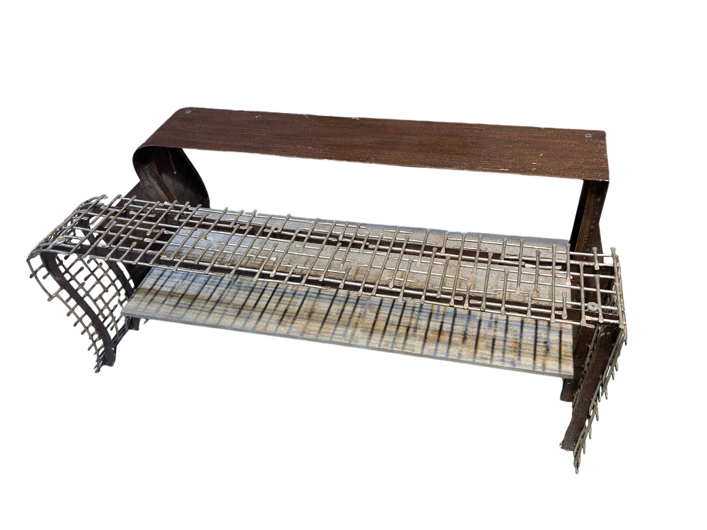Metal coffee table with glass top
