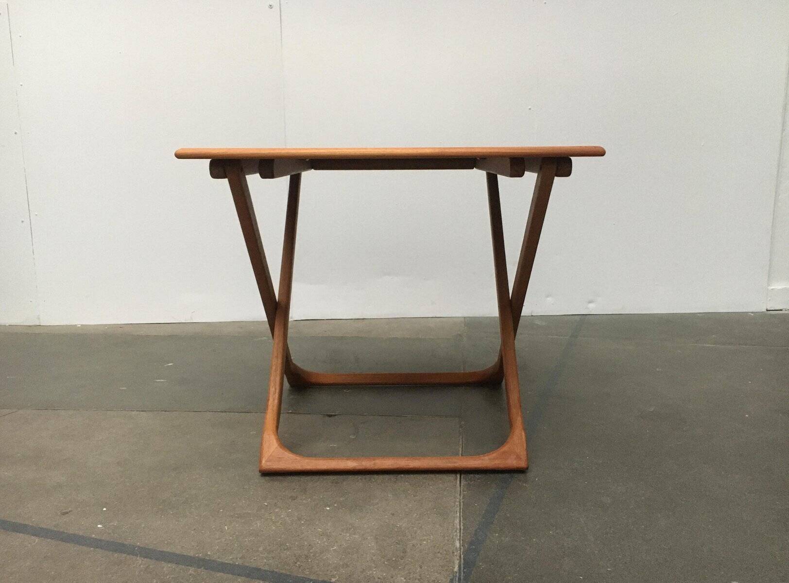 Danish folding table in teak from the mid-century by Juul Kristensen.