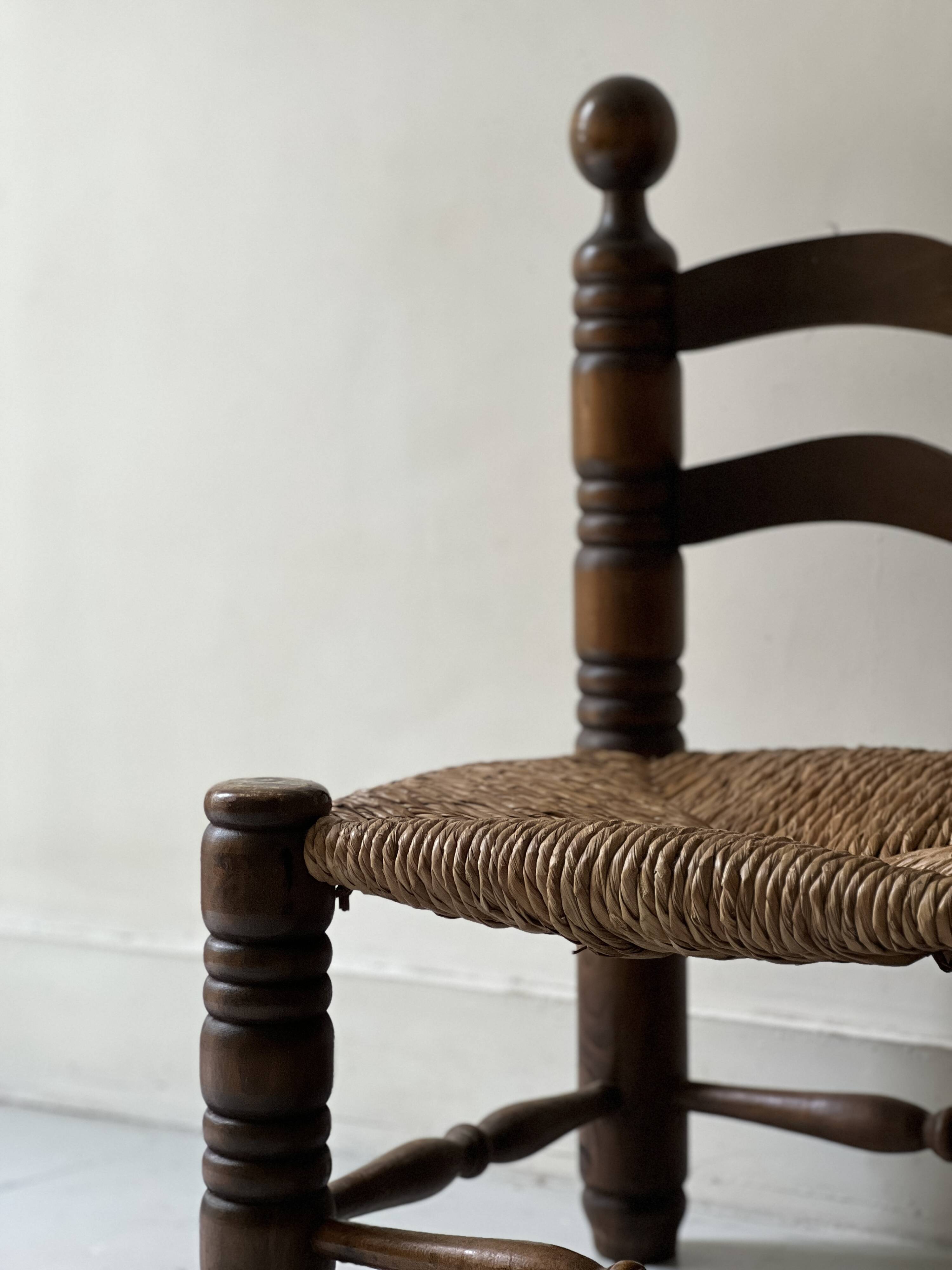 Vintage  chair in turned wood and straw, . 1950