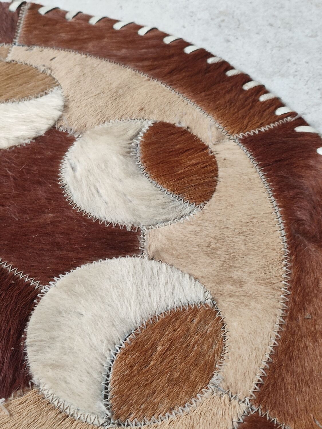 Cowhide patchwork rug