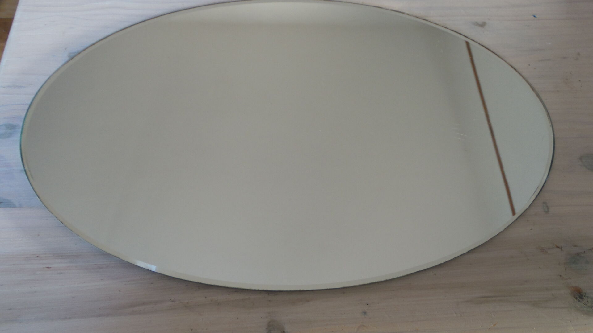 Beveled oval table mirror