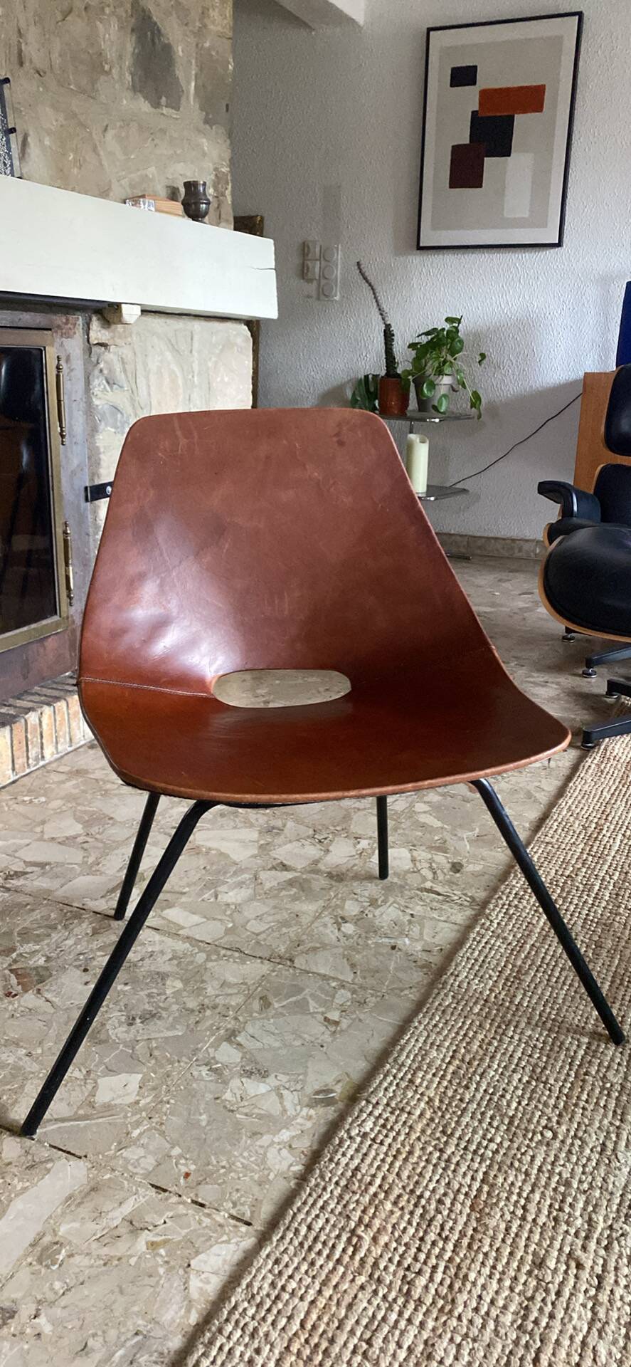 Leather chair by Pierre Guariche