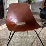 Leather chair by Pierre Guariche