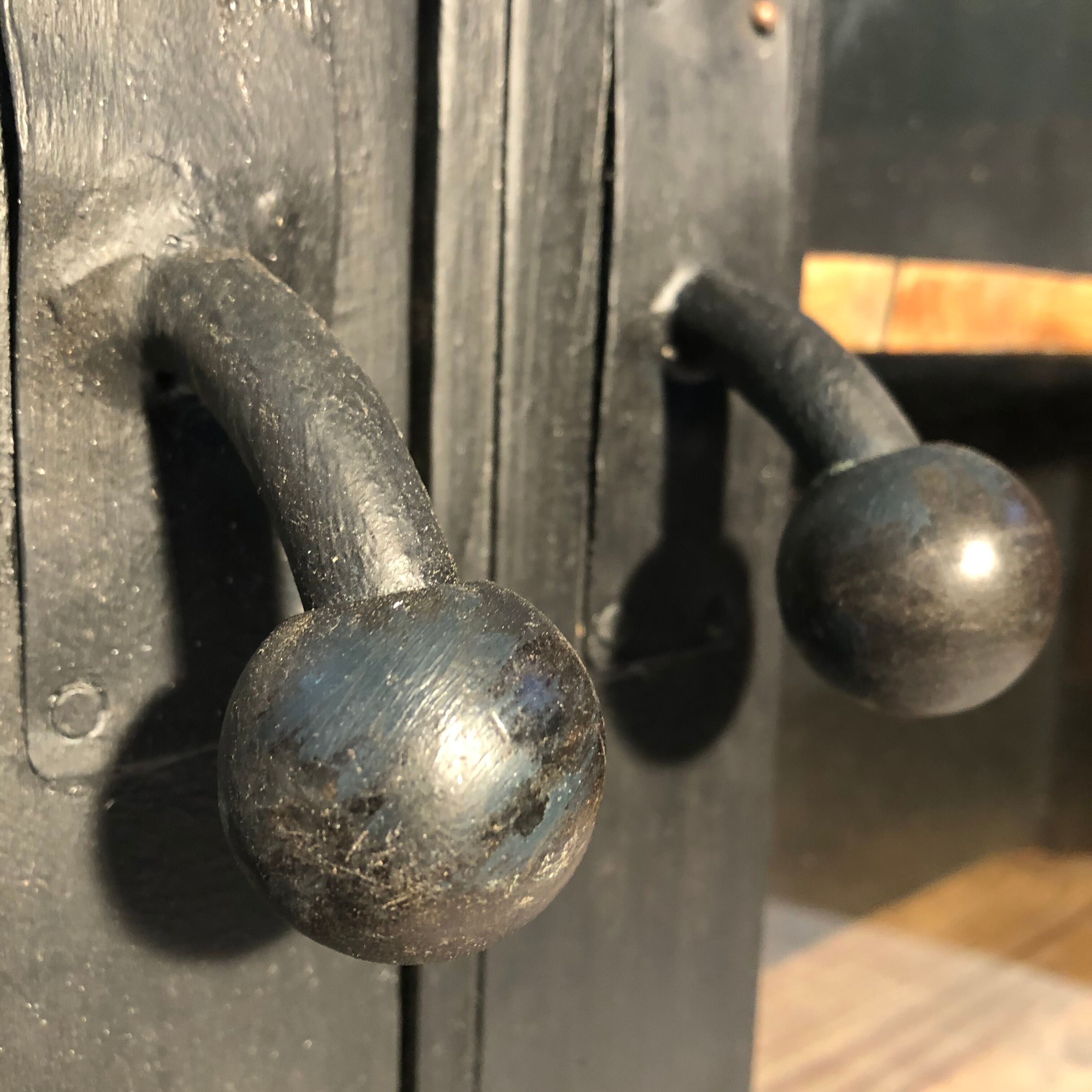 Former black painted wood workshop showcase