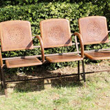 Row of theater folding seats, early twentieth century