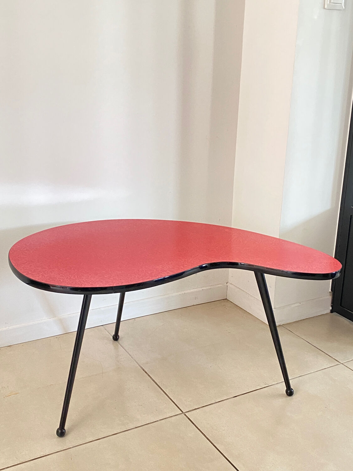 Red Formica bean coffee table