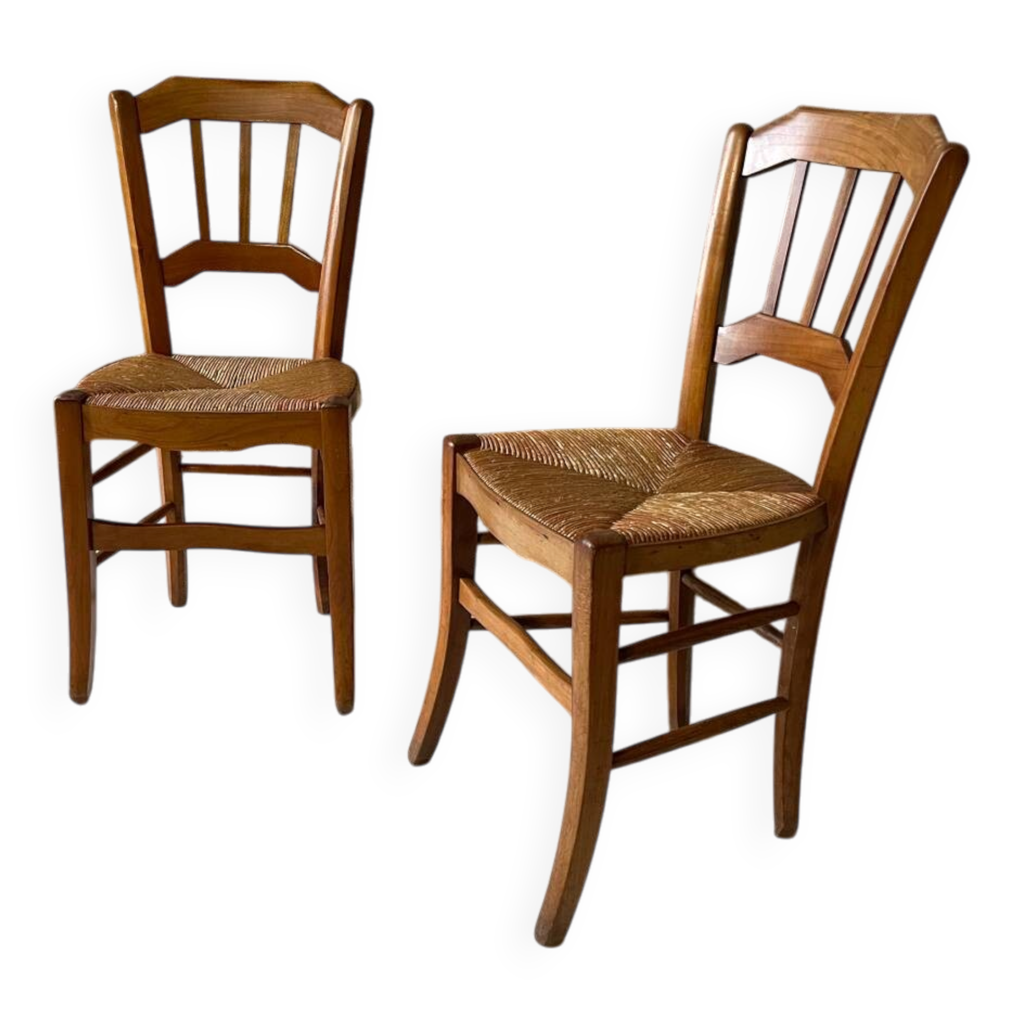 Set of 2 antique wooden and straw chairs.