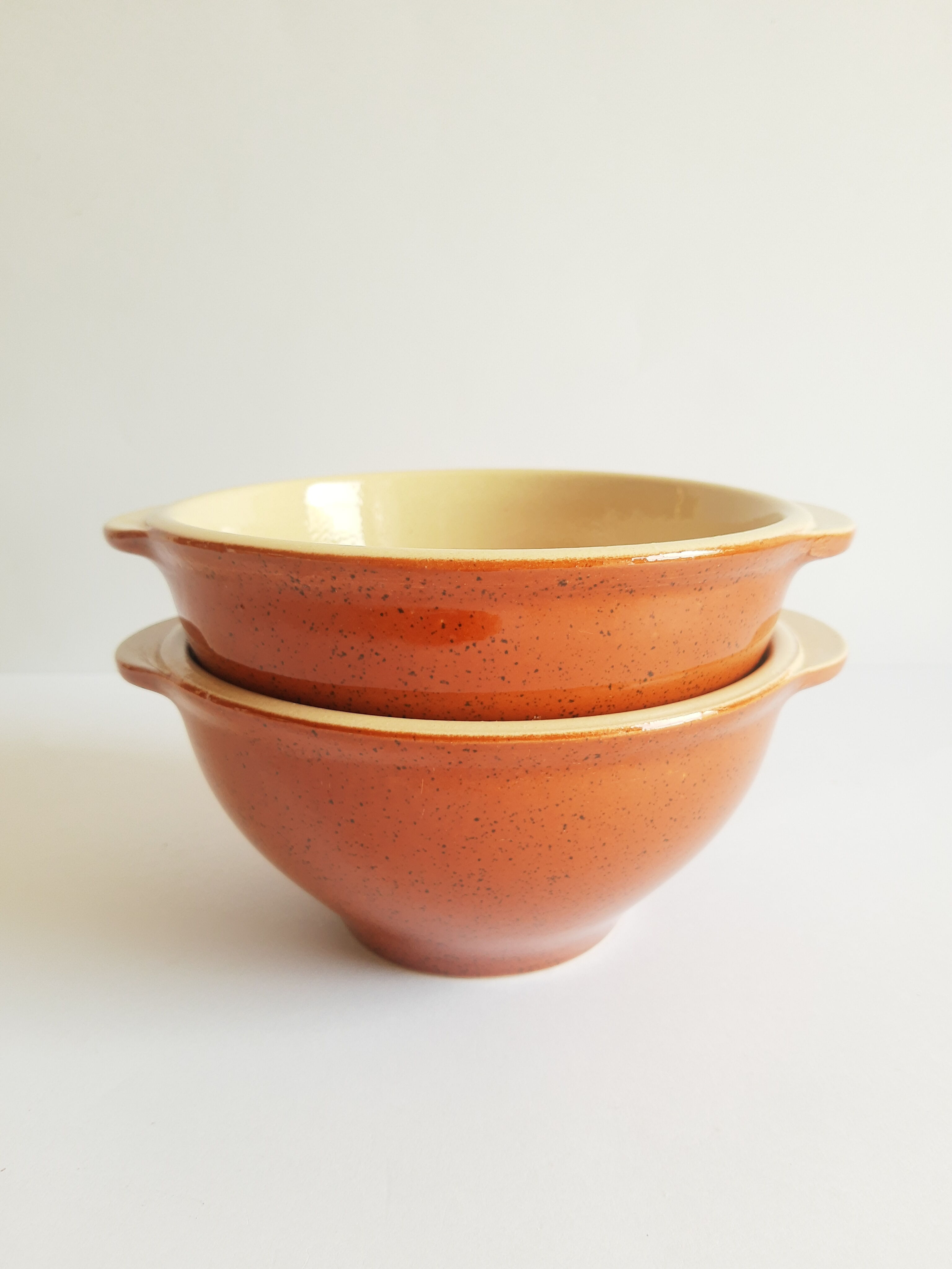 Duo of vintage Emile Henry cognac ear bowls