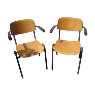 Pair of stackable class armchairs with Bakelite armrests