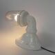 Wall lamp in porcelain with a transparent glass shade, 1930s.