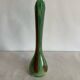Single flower vase in blown green glass