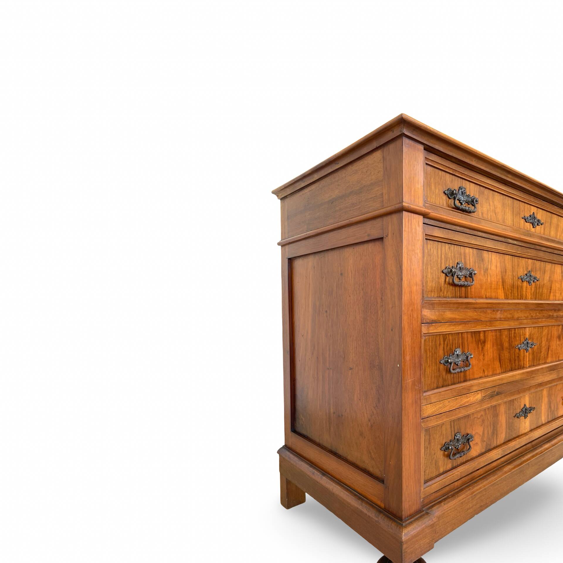 Antique walnut commode with bronze handles in the shape of a lion's mask,