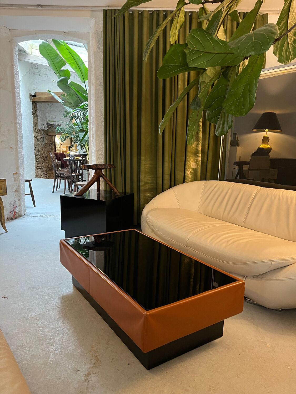 Caramel leather and black glass coffee table