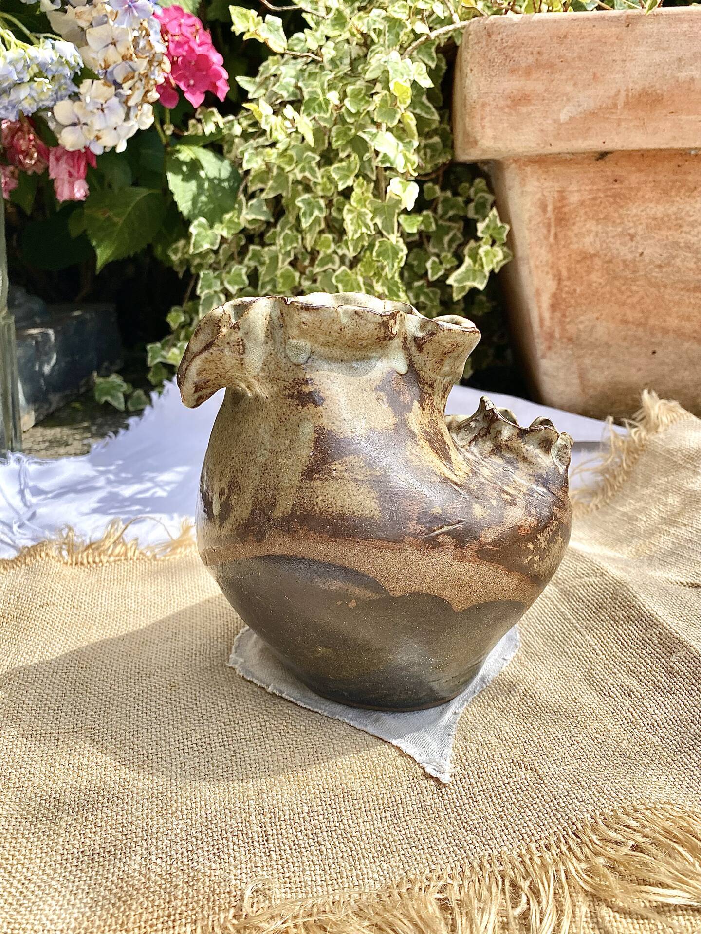 Sculptural vase in glazed stoneware, free form.