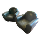 Green leather club chairs