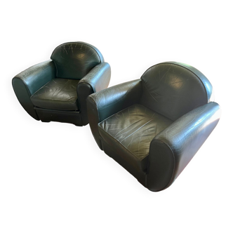 Green leather club chairs