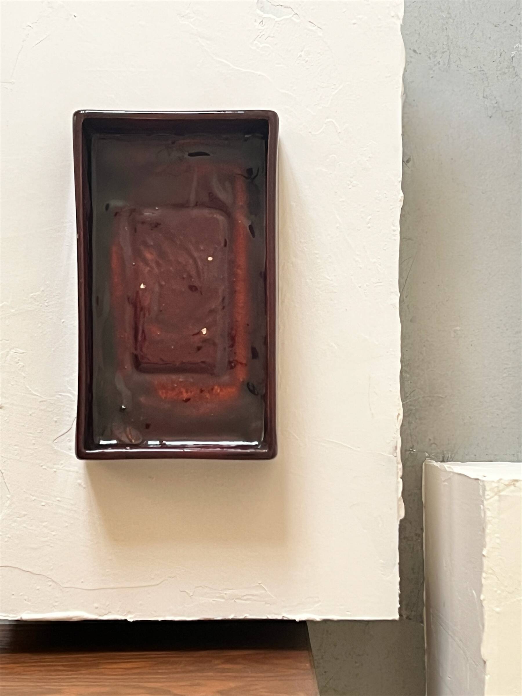 Bordeaux ceramic enamelled vide poche by Dutch artist A. Reuver, numbered.