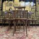 Suite de 7 chaises de bistrot cannées Baumann / Thonet / Fischel