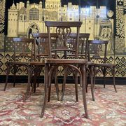 Set of 7 Baumann / Thonet / Fischel caned bistro chairs