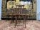 Suite de 7 chaises de bistrot cannées Baumann / Thonet / Fischel