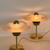 Pair of Art Deco bedside lamps in brass and engraved glass.
