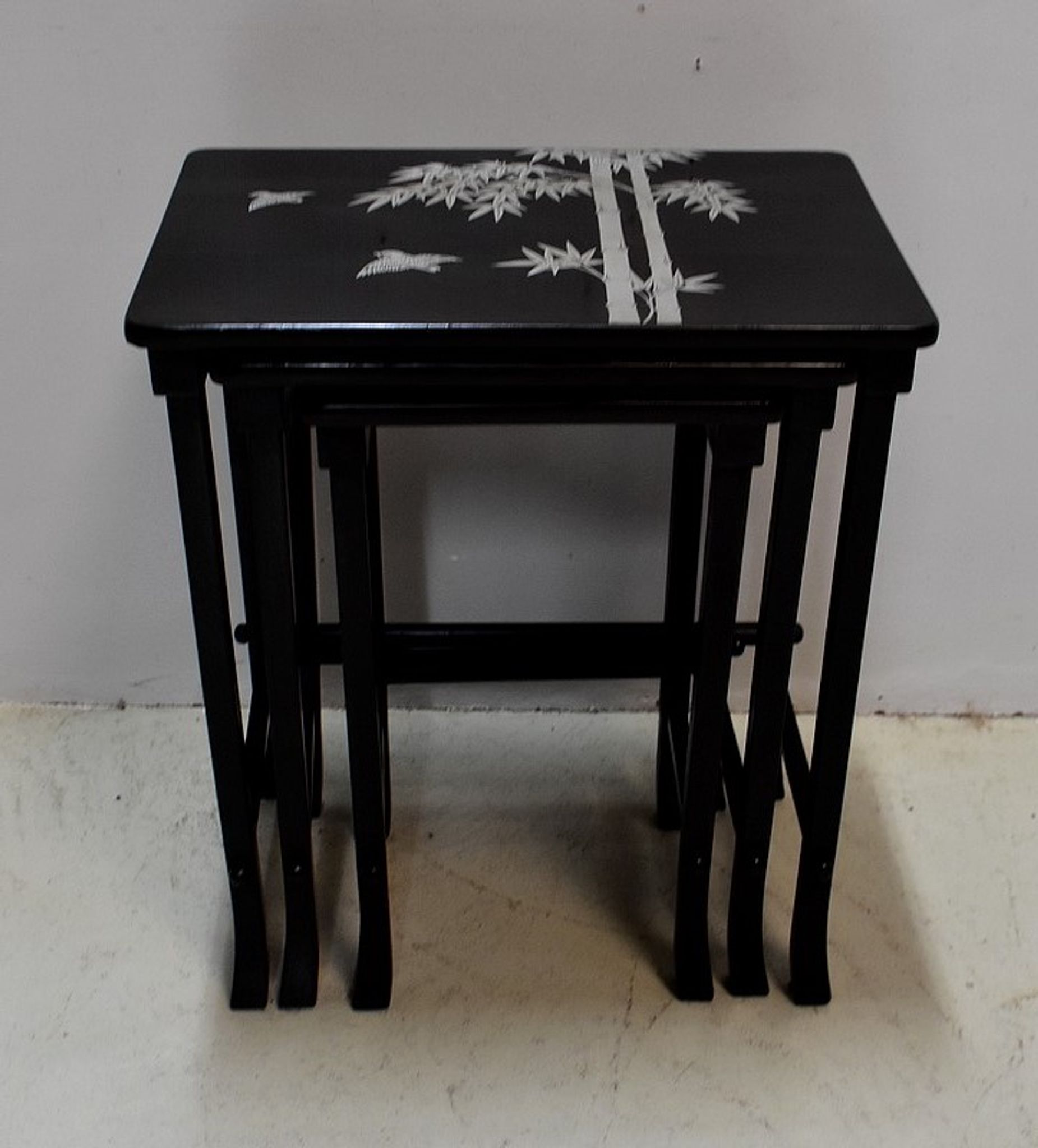 Chinese pull out tables in lase black
