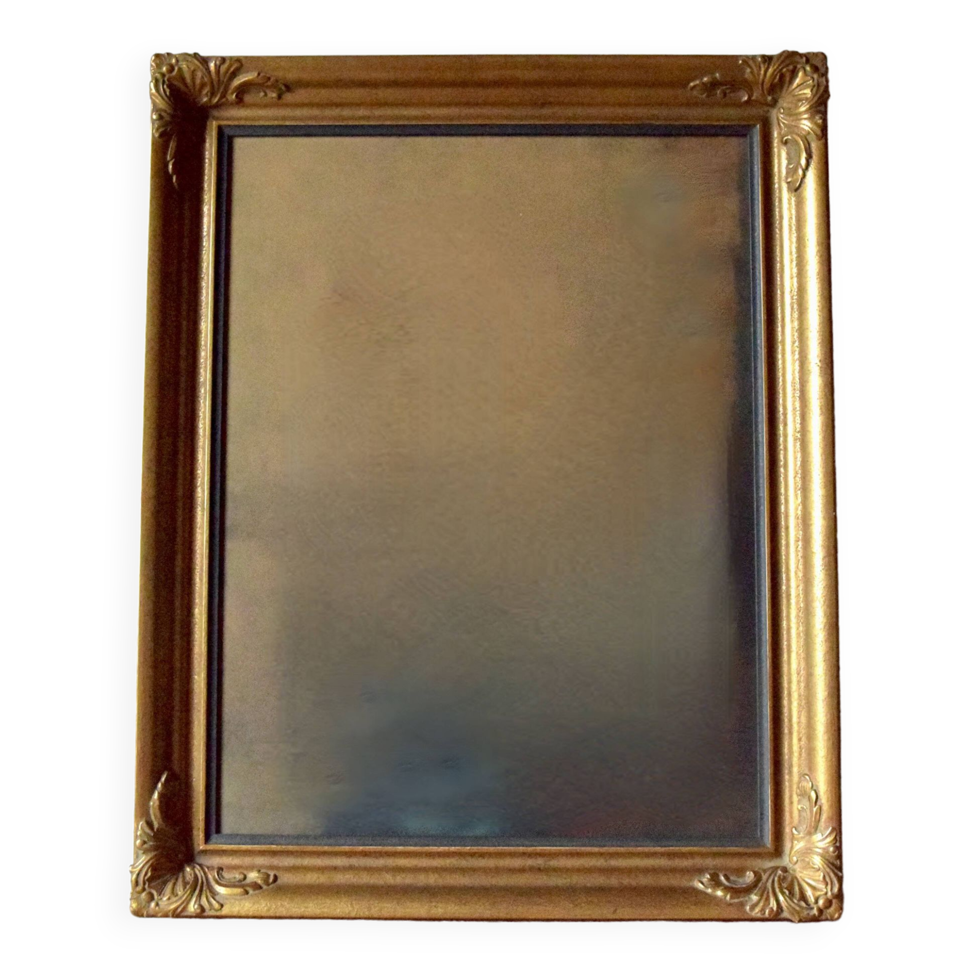 Old large wall frame in gilded carved wood