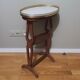 Saddle pedestal table with marble top in Louis XV style