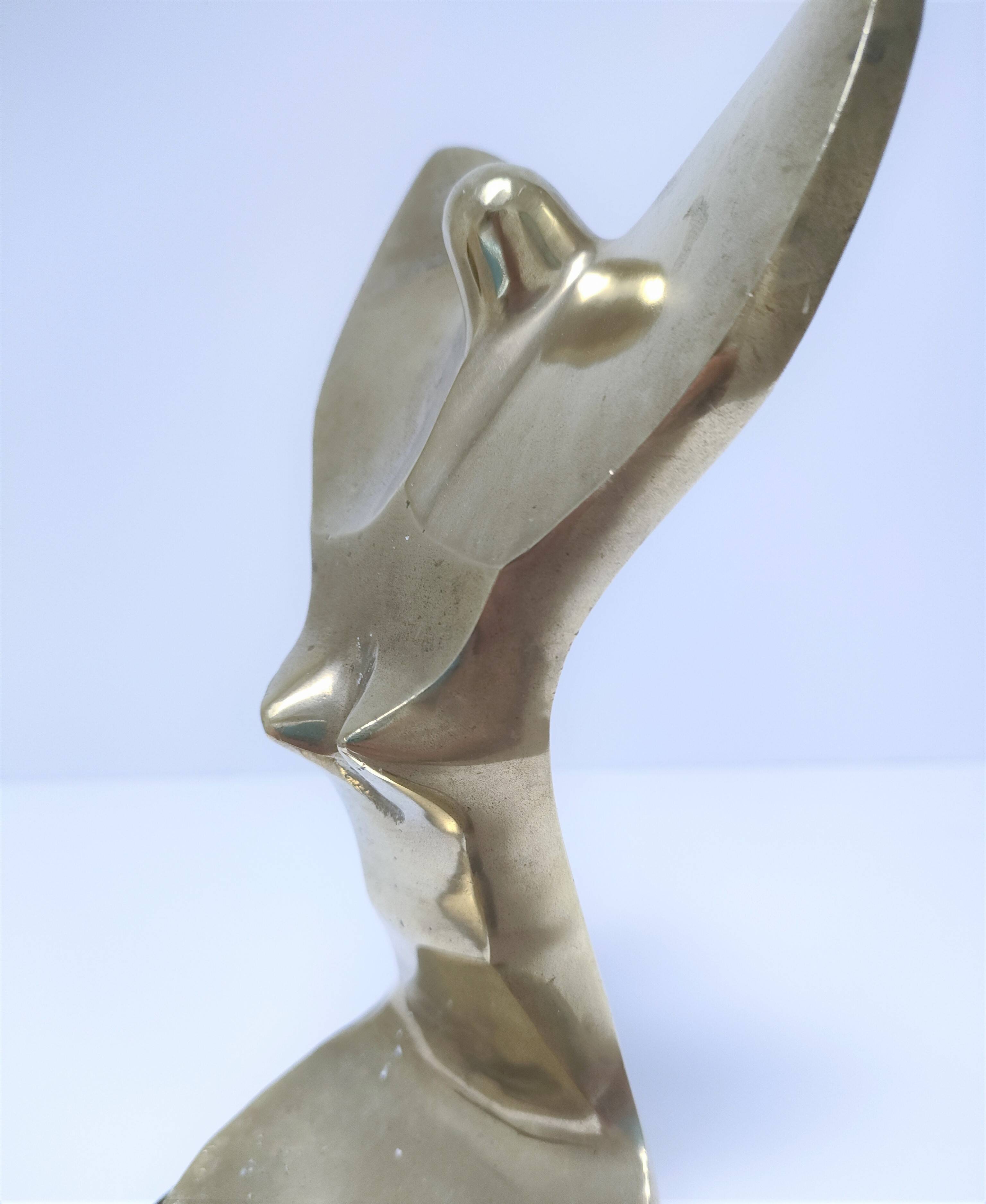 Gilded bronze and sculptural wood paperweight